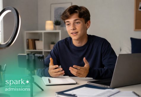 Student recording an online study video with a phone, ring light, laptop, and notebook